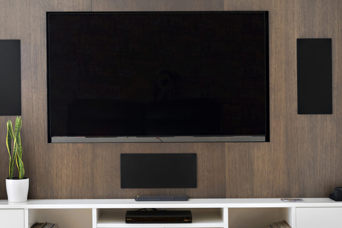an image showing cable management in television connection in a lounge