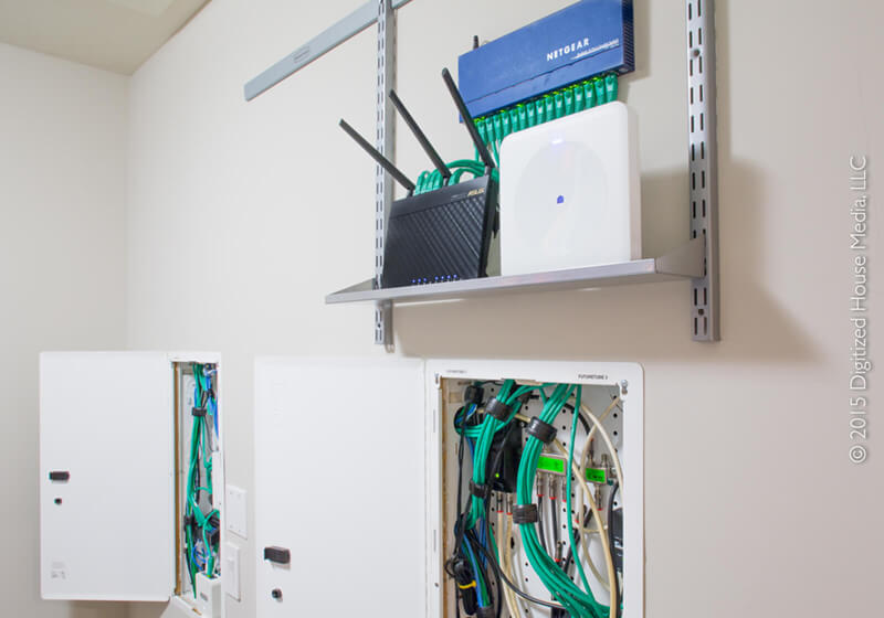 wifi and data cable sitting on a shelf after being rewired